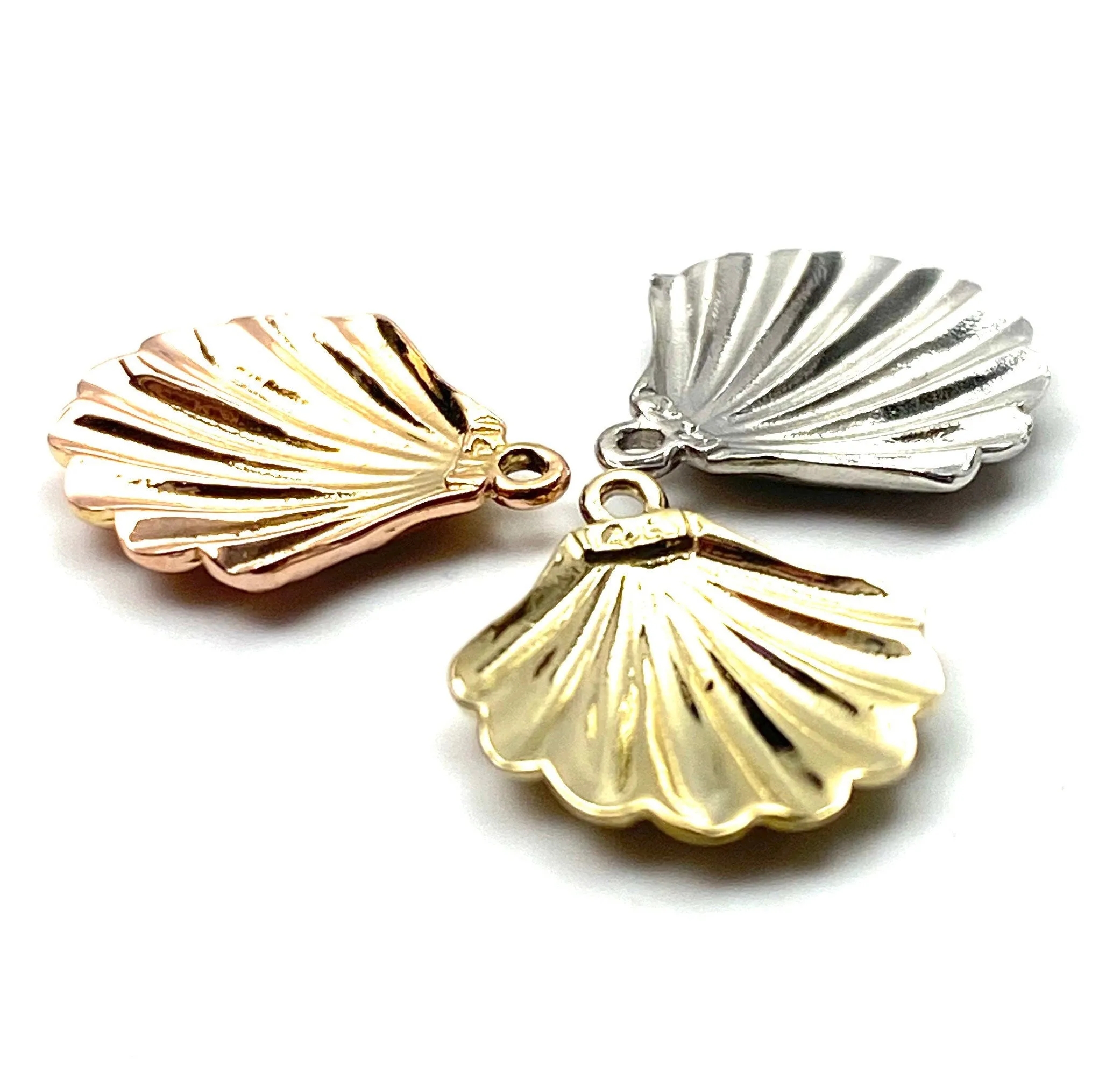 14K solid gold, while gold and rose gold sea shell charm