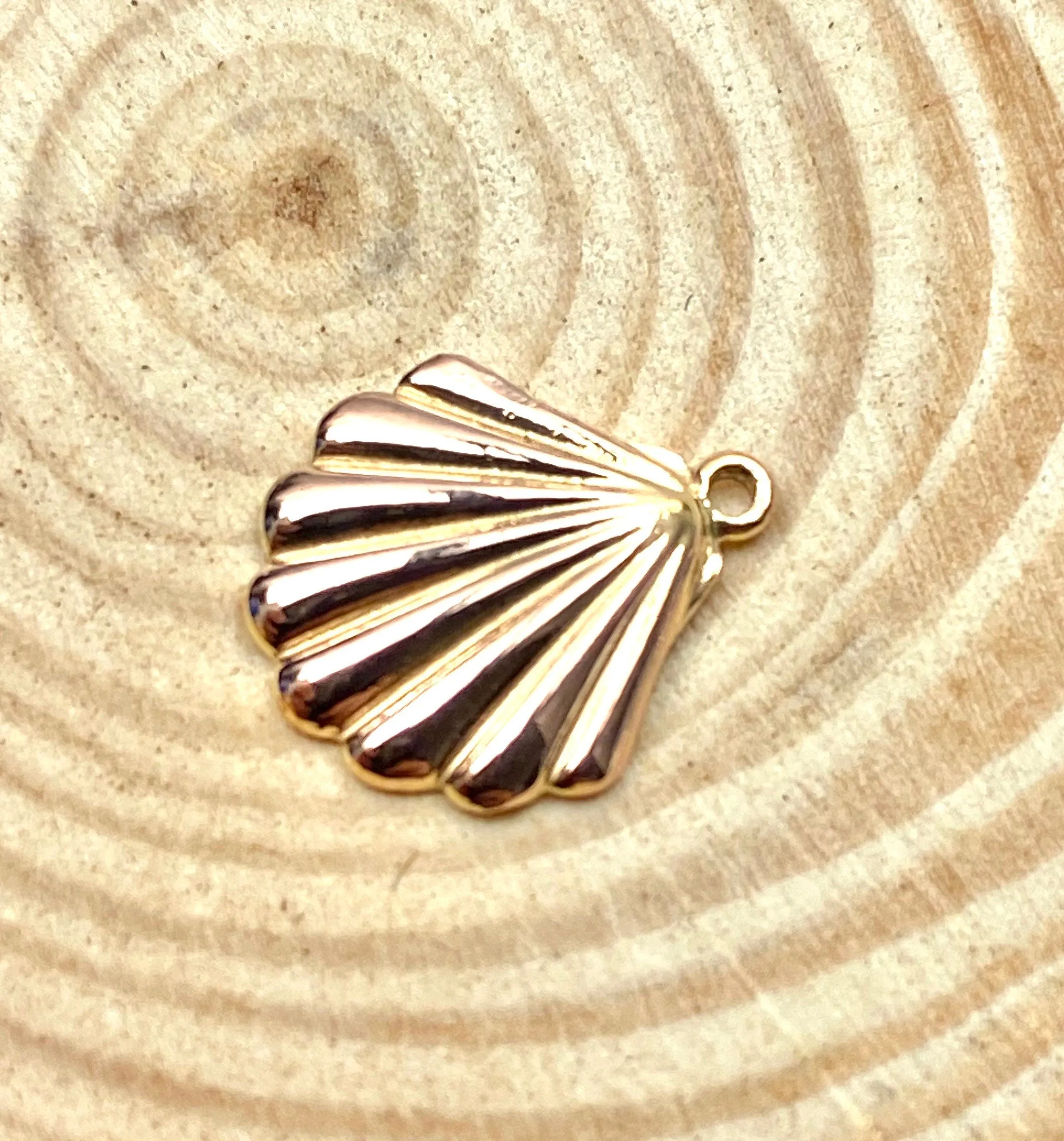 14K solid gold, while gold and rose gold sea shell charm