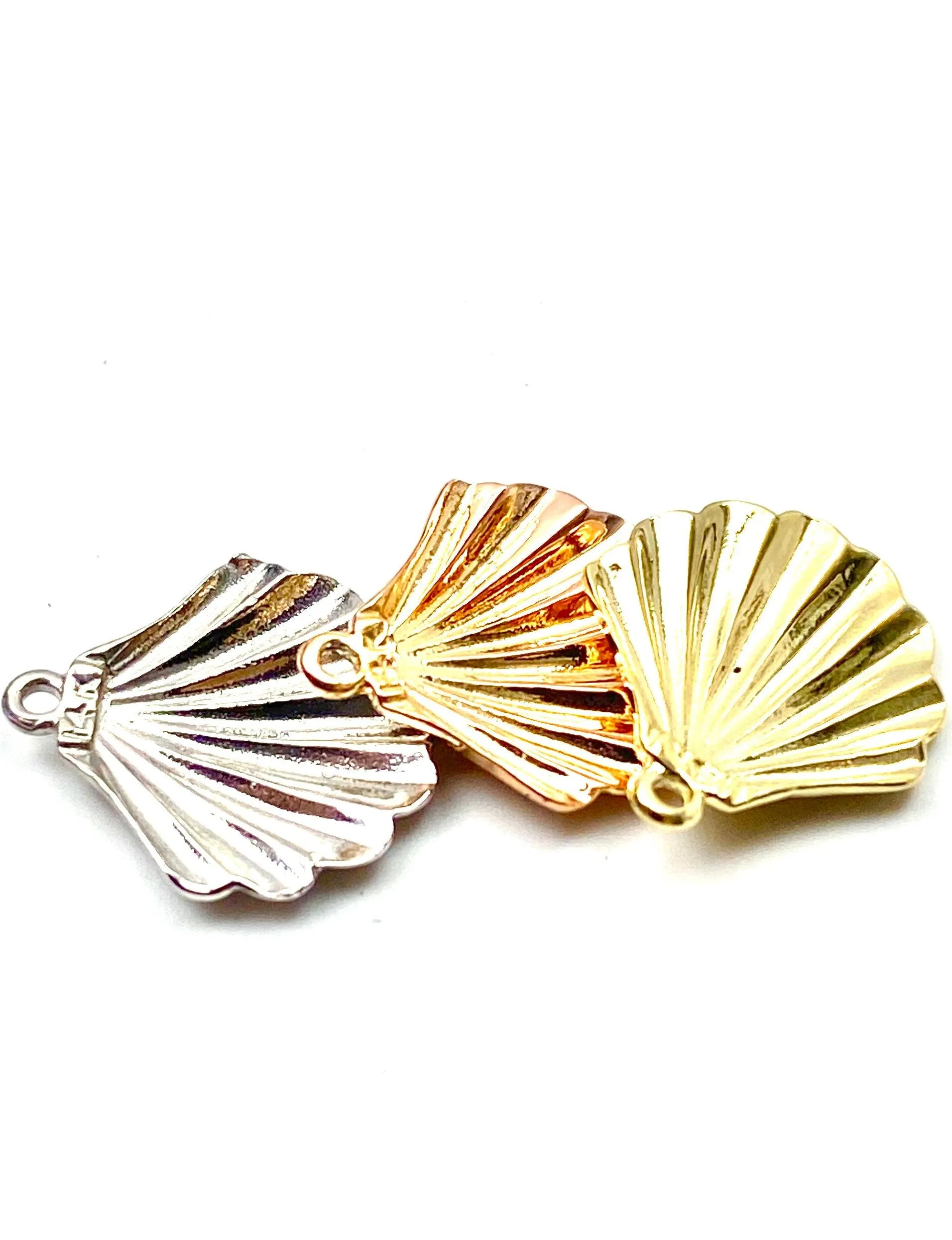 14K solid gold, while gold and rose gold sea shell charm