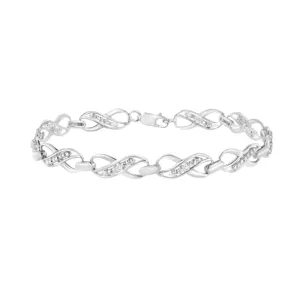 .925 Sterling Silver Prong Set Diamond Accent Ribbon and Infinity Link Bracelet (I-J Color, I3 Clarity) - 7.25"