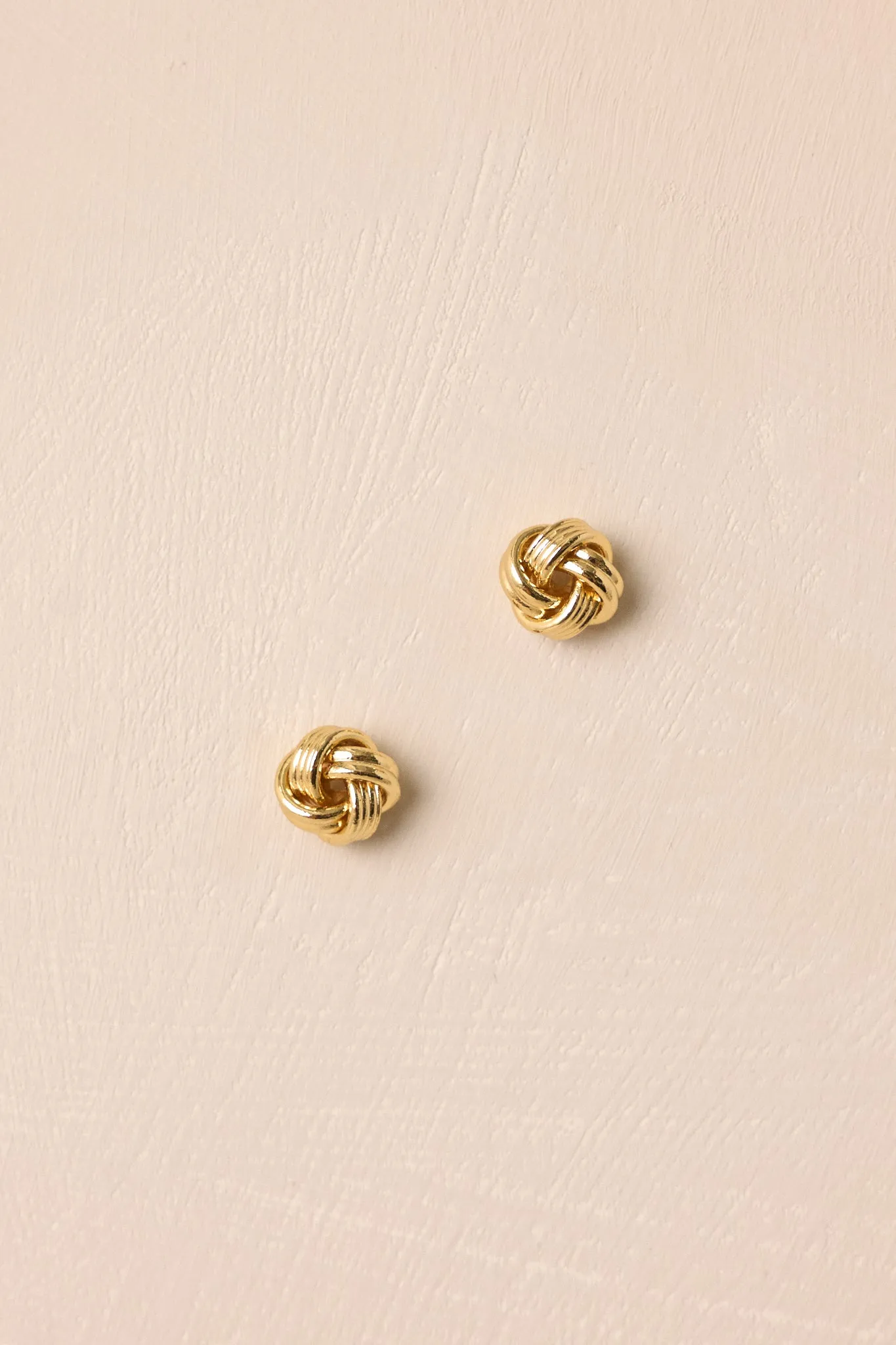 Always Independent Gold Knot Stud Earrings